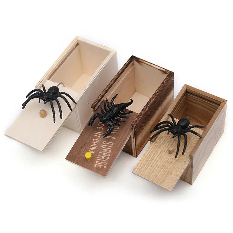 Wooden prank scare box closed, dimensions 9.1cm x 6.1cm x 6.5cm, for April Fools' jokes.