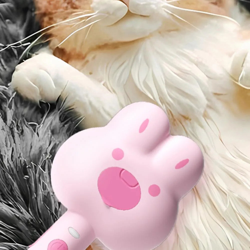 Rechargeable pet steam brush comb in green, pink, or white with a long handle.