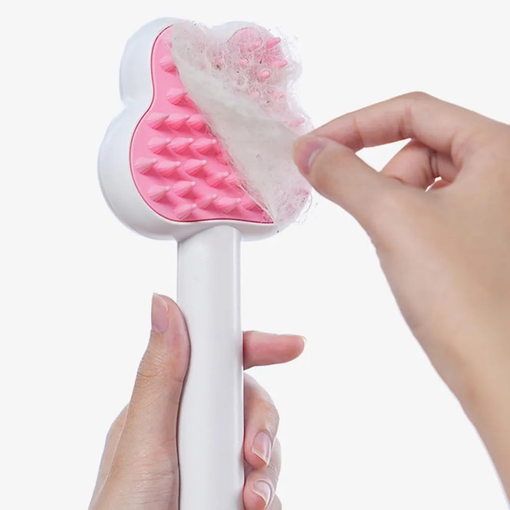 Rechargeable pet steam brush comb in green, pink, or white with a long handle.