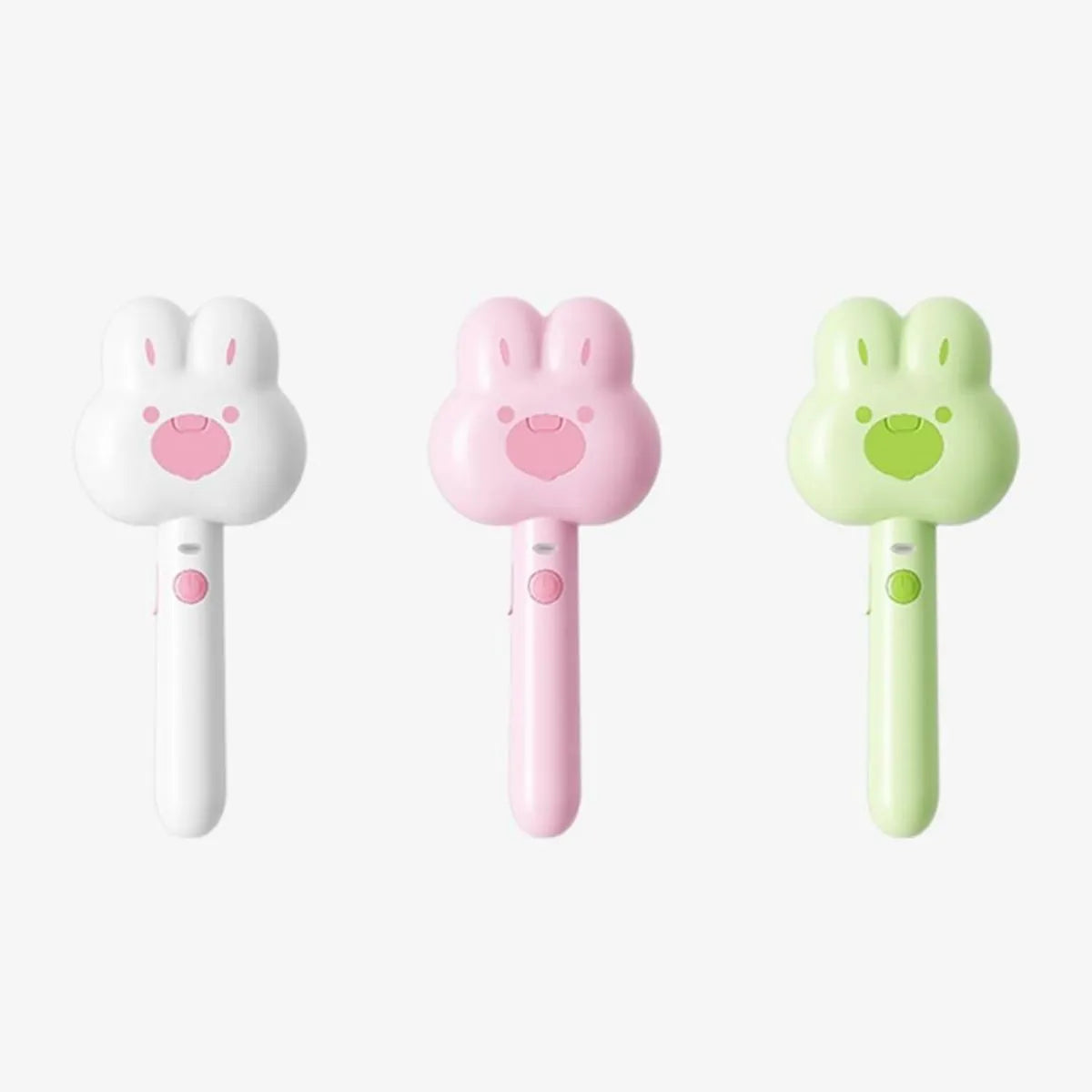 Rechargeable pet steam brush comb in green, pink, or white with a long handle.