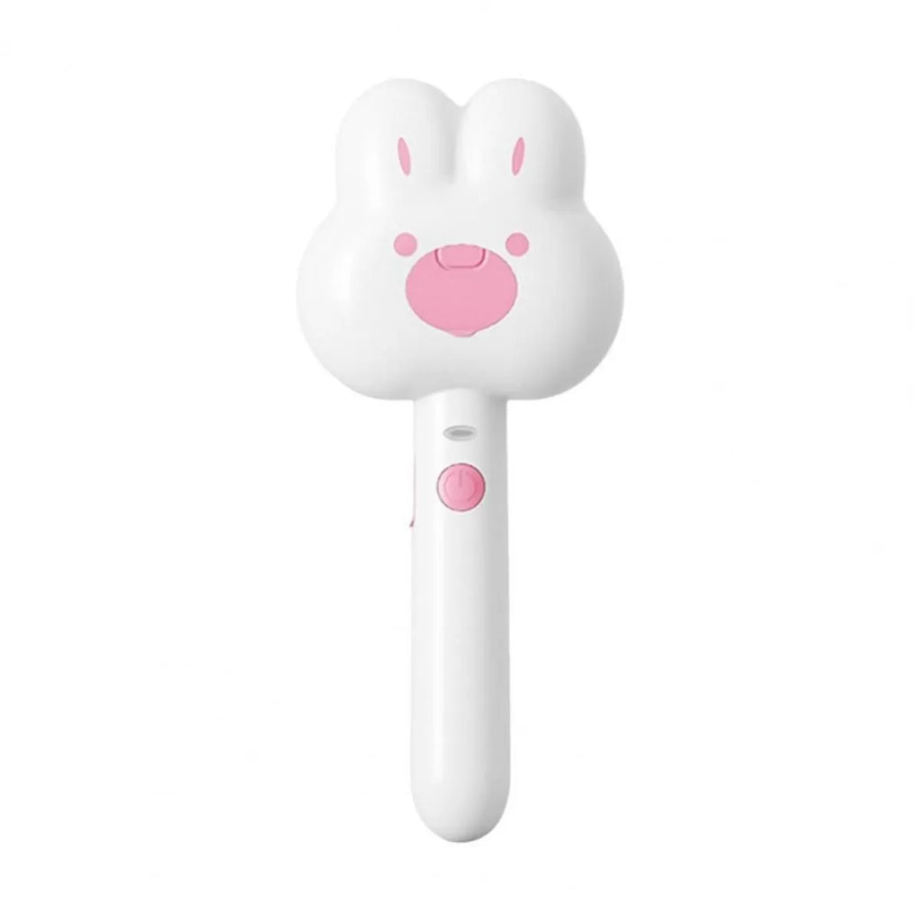 Rechargeable pet steam brush comb in green, pink, or white with a long handle.