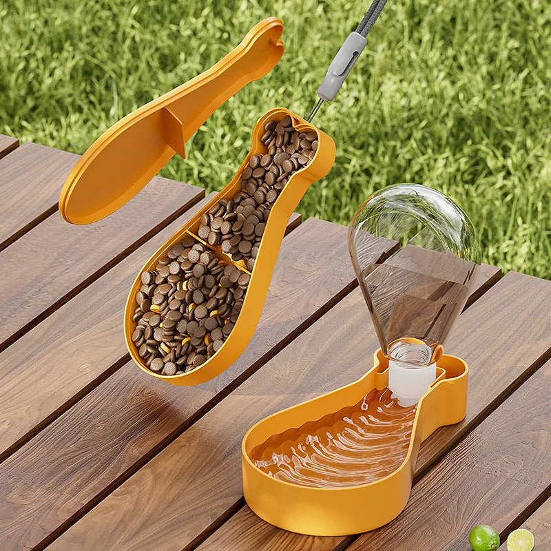 Orange and white portable pet water bottle with attached food container for dogs and cats