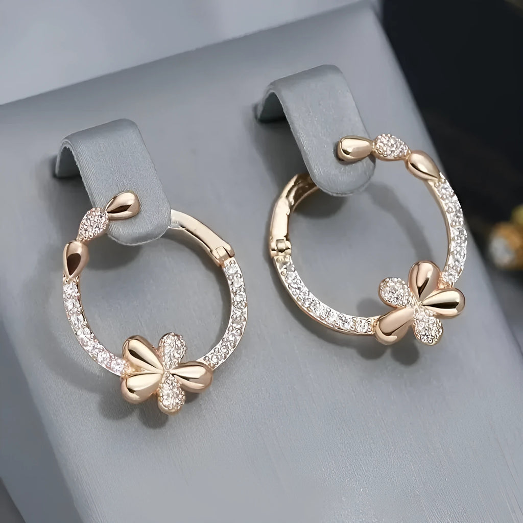 A pair of round geometric hoop earrings for women made from electroplated copper.