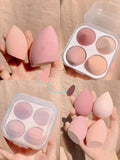 Four makeup egg sponges in grape, mango, mint, and peach colours, each 6cm in size