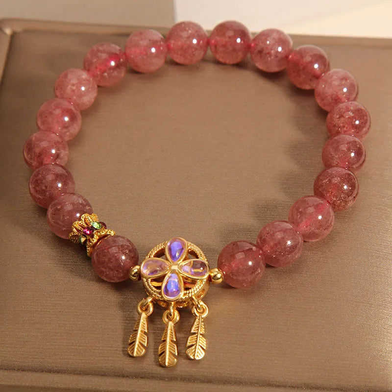 Strawberry quartz women's bracelet with four leaf clover dream catcher design and ball pendant charm
