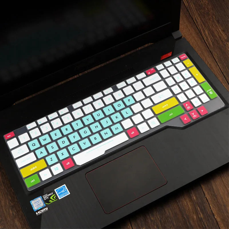 ASUS Flight laptop keyboard protective film cover in gradient blue colour on a keyboard.