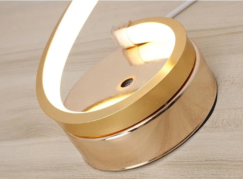 LED table lamp with metal base and acrylic curved shade, 125mm x 450mm, 24W, gold or white