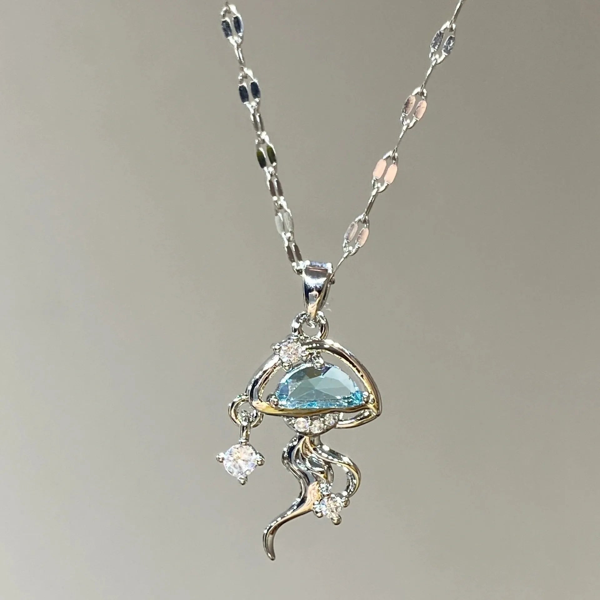 Women's blue jellyfish pendant necklace on adjustable 925 sterling silver chain
