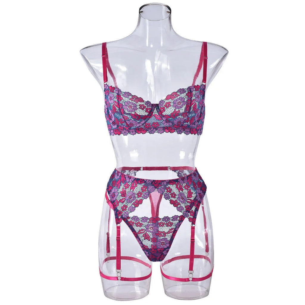 Rose red women's embroidered bikini set on a white background