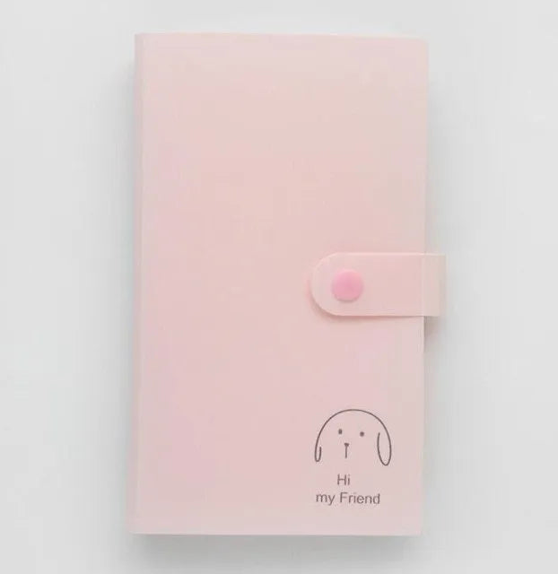 Blue PVC and PP business card holder book with protective shell showing insert pockets and smile logo.