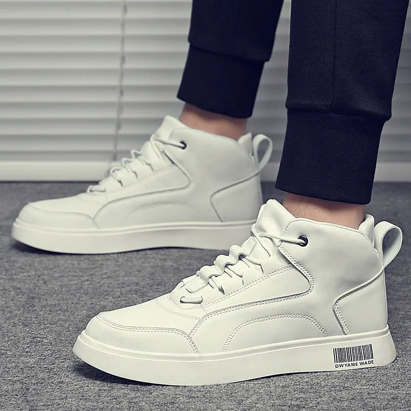 Men's white mid-top sports board shoes with low heel, round toe, and rubber sole on a casual background