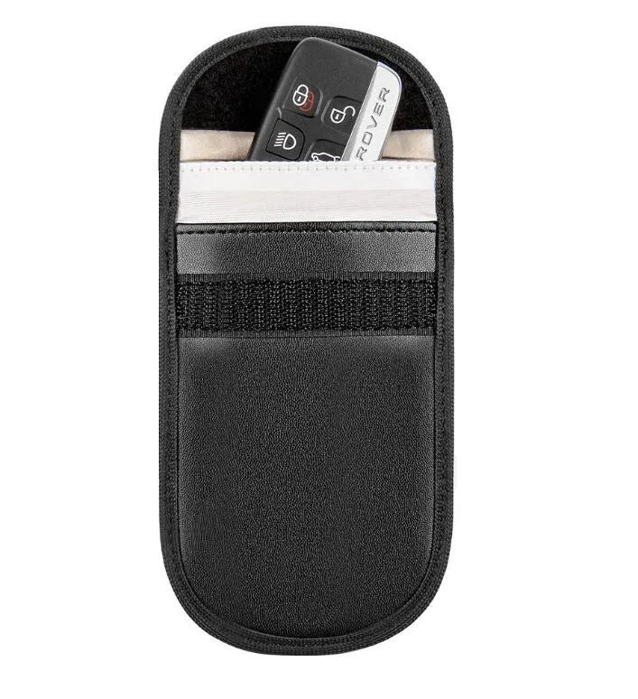 Black Faraday cage key signal blocker case measuring 13.5x9.5cm with microfiber construction and complete electromagnetic shielding