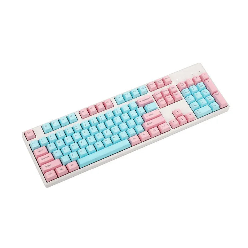 Pink opaque PBT keycap set for mechanical keyboards showing side-engraved legends and 1.5mm thickness