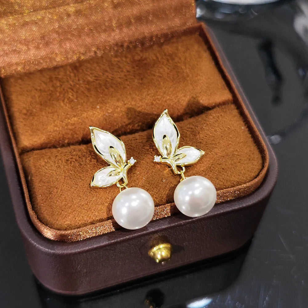 Zircon painting oil butterfly earrings for women with copper construction and electroplated colour finish