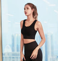 Women's quick-dry polyester sports bra for running and yoga, shock absorption, in black blue pink or white