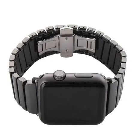 Black ceramic chain link Apple Watch strap with stainless steel clasp on a 42mm watch.