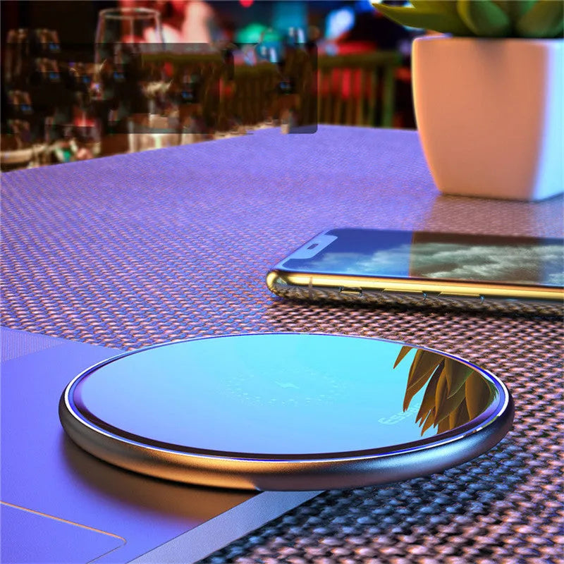 Black or white wireless charging pad with aluminium alloy surface and LED light, measuring 10.1cm by 7cm