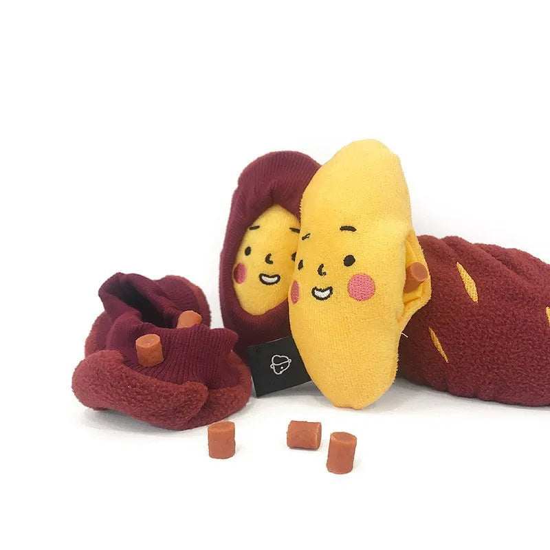 Sweet potato pet puzzle toy with removable peel showing internal food pockets for hiding treats