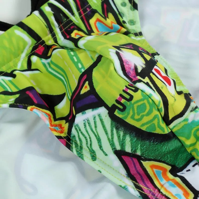 Men's printed swimming trunks in polyester showing cyber, ice cream, streamer, and skull pattern options.