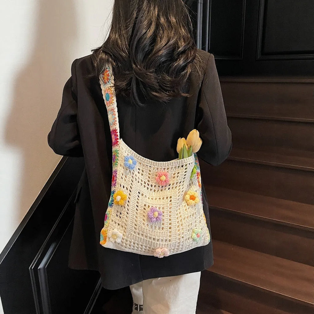 Casual hollow weave beach shoulder bag in milky white showing knitting texture