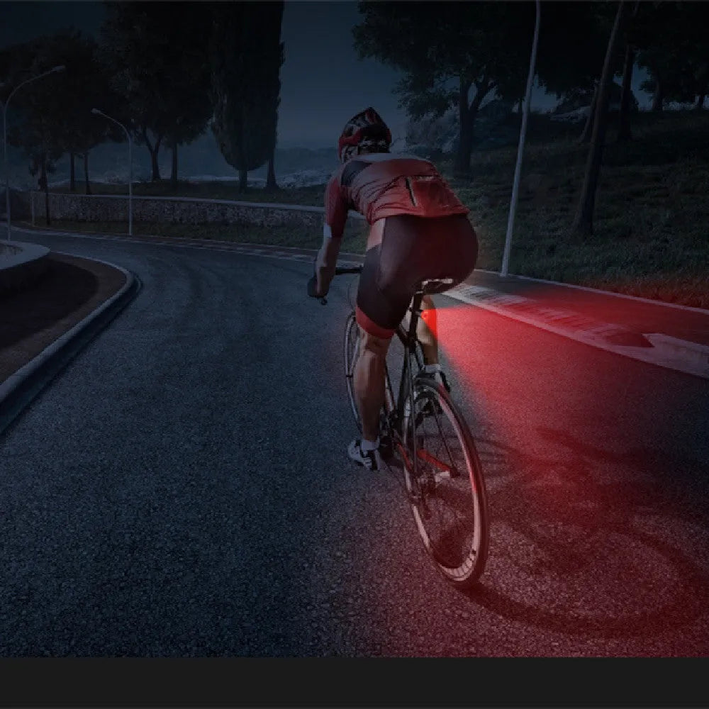 Black aluminium smart brake sensing USB charging bicycle taillight showing 35x39x58mm dimensions