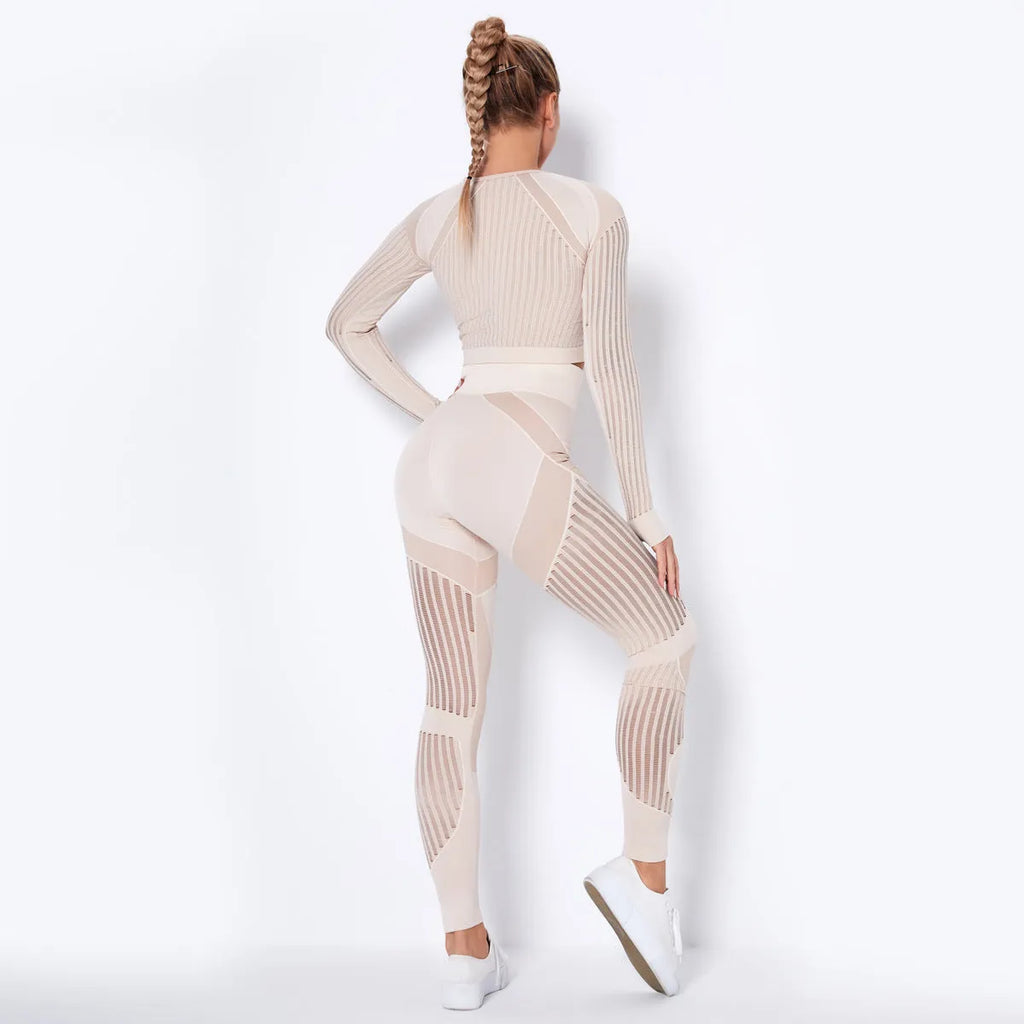 Women's long-sleeved seamless yoga suit in a striped pattern, shown in a stretch fabric suitable for exercise.