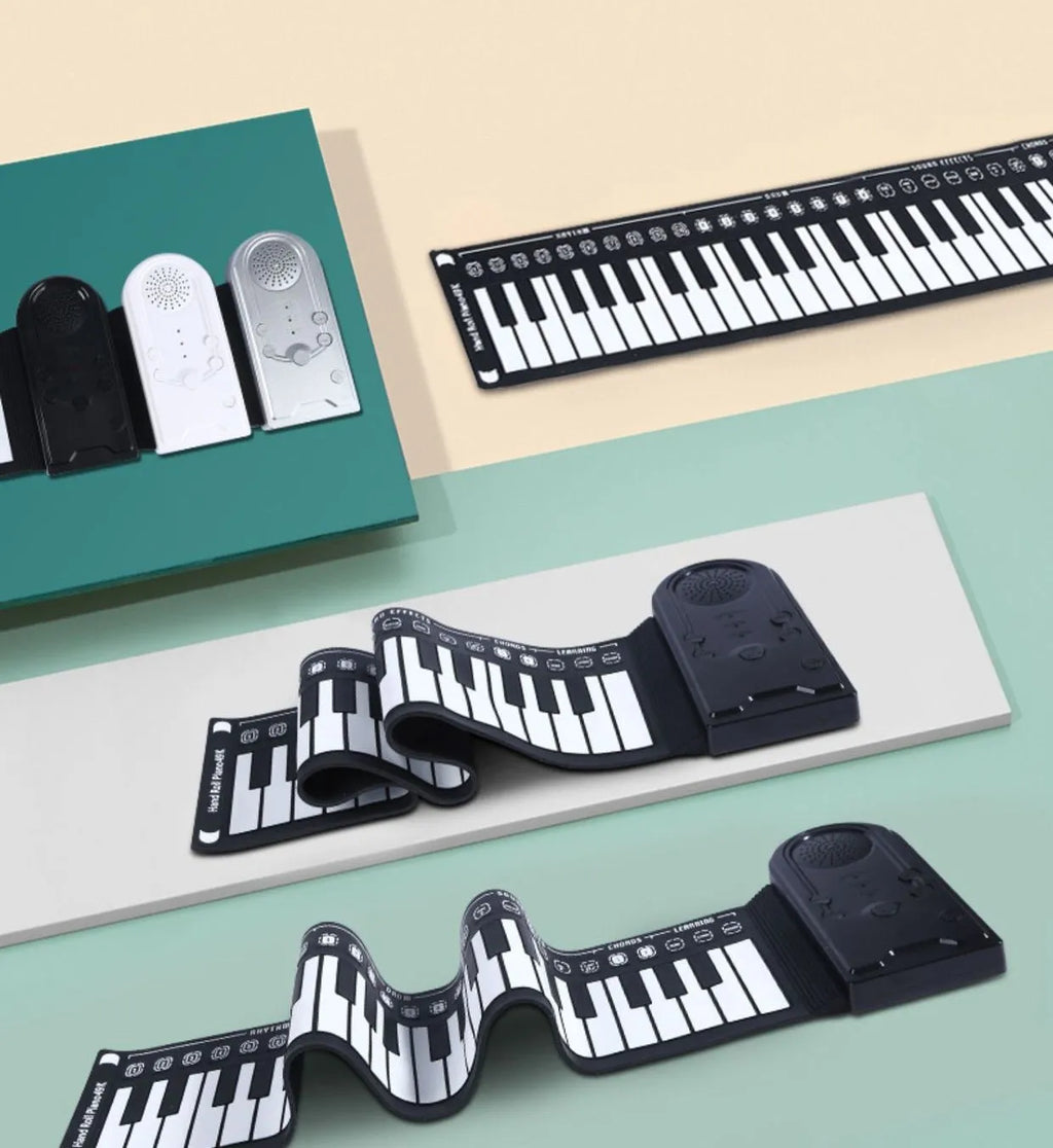 Folding electronic keyboard showing 49 silicone keys, folded to 28cm length with pearl white finish