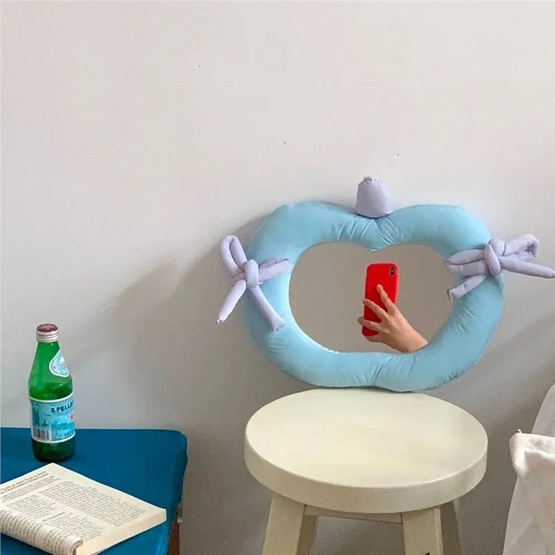 INS Korean-style wall mirror with aluminium lens and soft fabric frame in green apple colour.