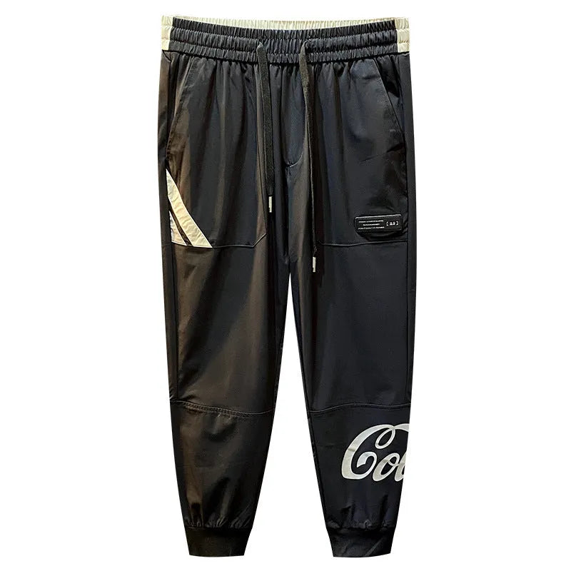 Black men's casual cropped trousers with elasticated ankle bands made from ultra-thin ice silk cotton.