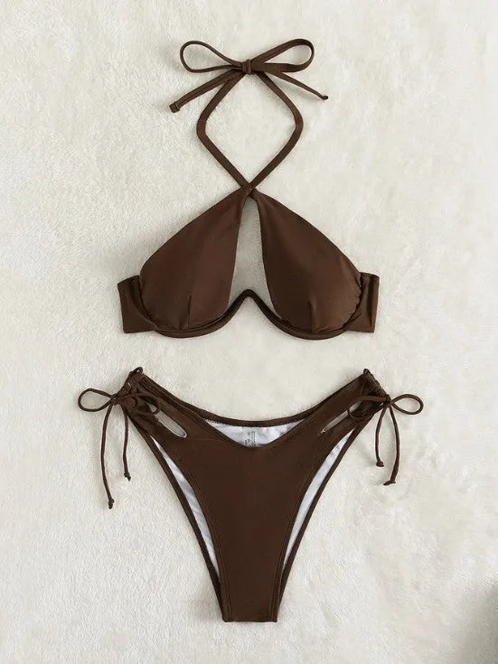 Women's brown halter-neck bikini set with backless top and briefs bottom on a mannequin