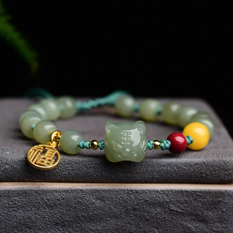 Natural Hetian Jade bracelet with animal Zodiac modelling and unset Cinnabar Beeswax beads.