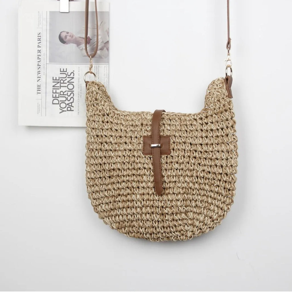 Handmade beige woven shoulder bag with decorative sewing thread details and sandwich pocket