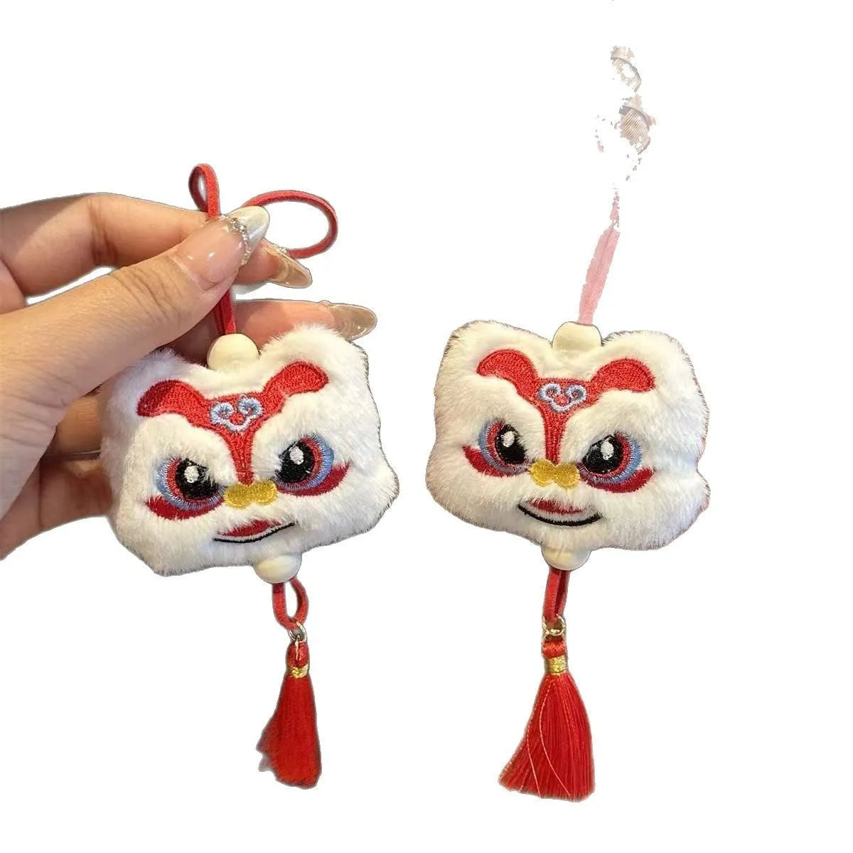 Handmade blue plush lion keychain ornament with star stone accent and embroidered cartoon features