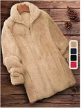 Double-sided fleece jacket in black with a velvet exterior and fleece lining.