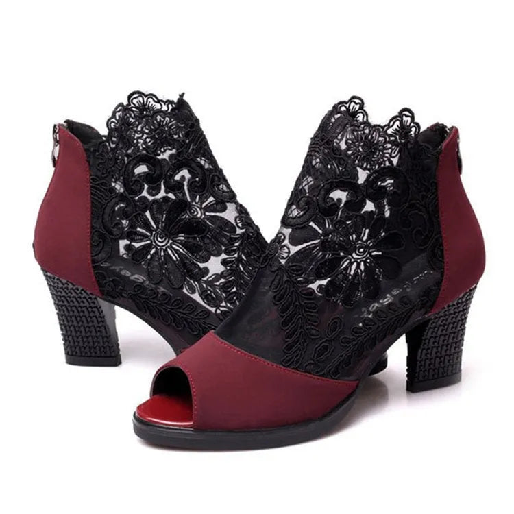 Lucyever women's gladiator sandals with square heel, lace upper, flower pattern, and zip closure in black colour