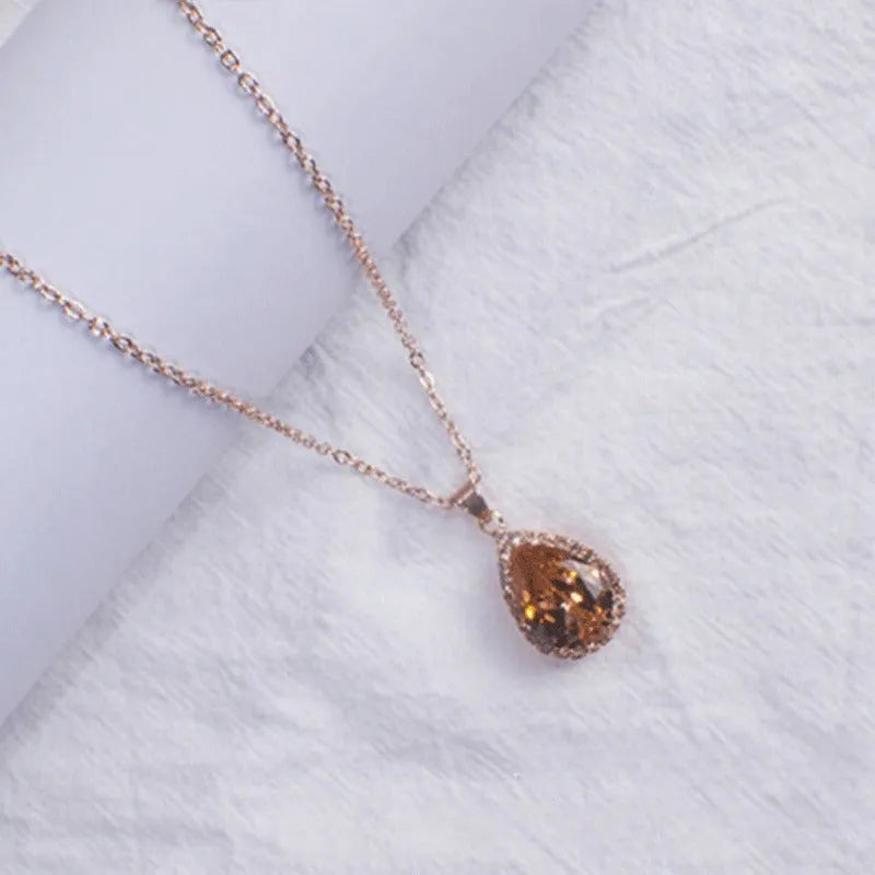 Water drop rose gold rhinestone necklace with adjustable chain and geometric pendant in multiple colours