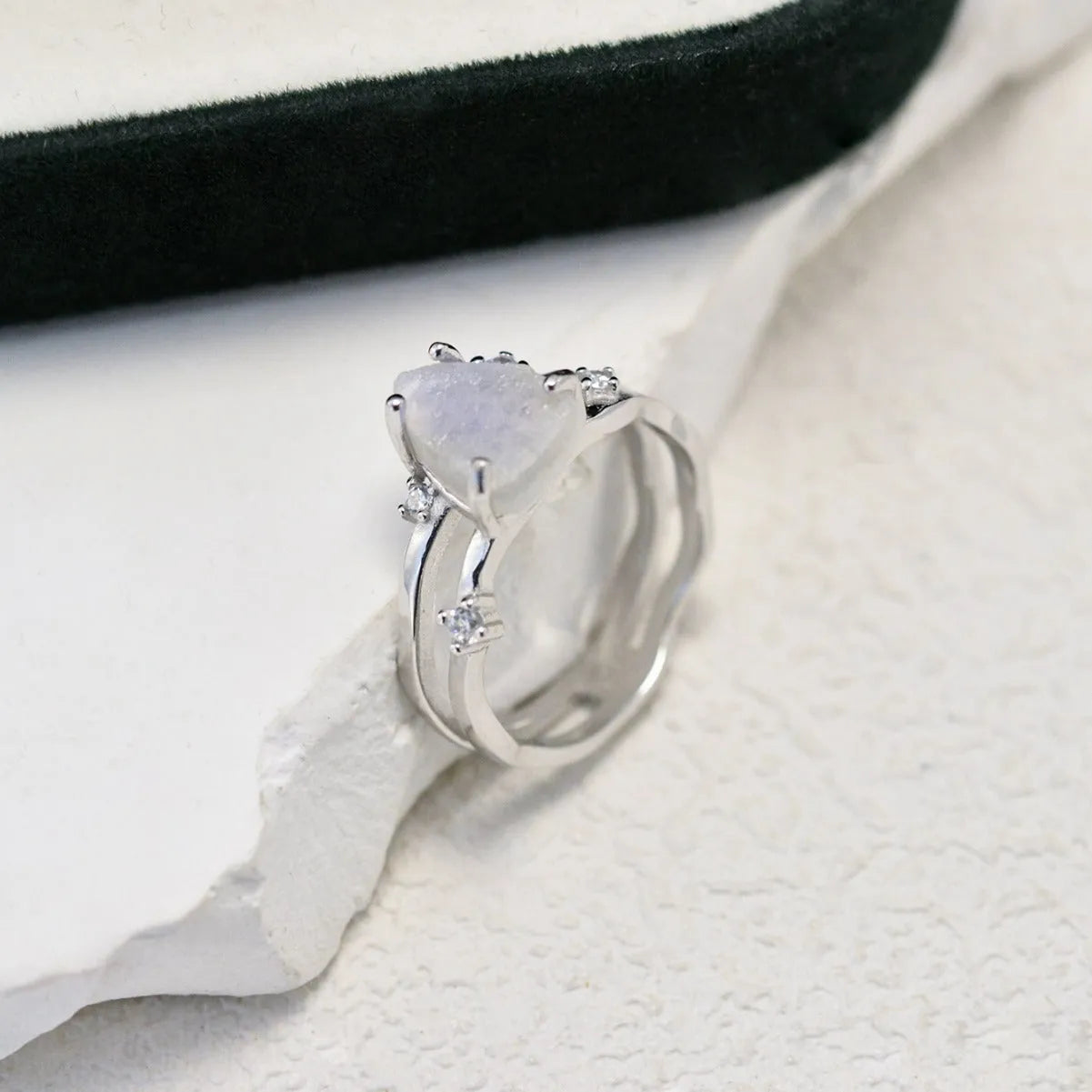S925 sterling silver irregular triangle moonstone ring in rose gold finish on a hand