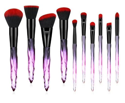 10 clear crystal foundation brushes with diamond shank handles and synthetic bristles arranged in set