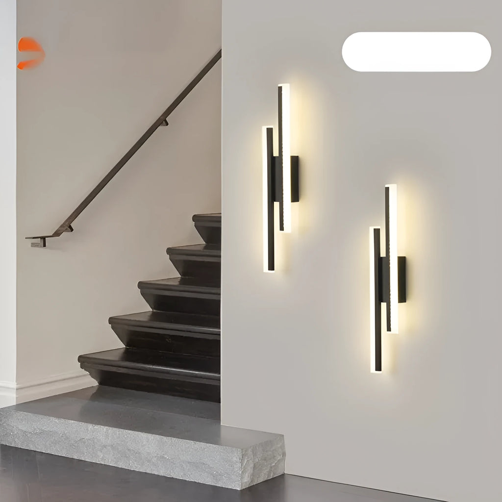 Gold-finished double line wall lamp, 500mm long, with modern design on a white wall.