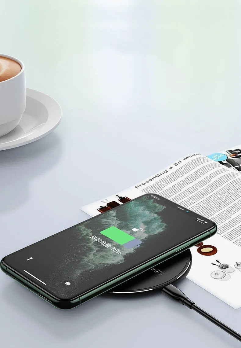 Black Kuulaa wireless charging disc for mobile phones with LED indicator and Micro USB port