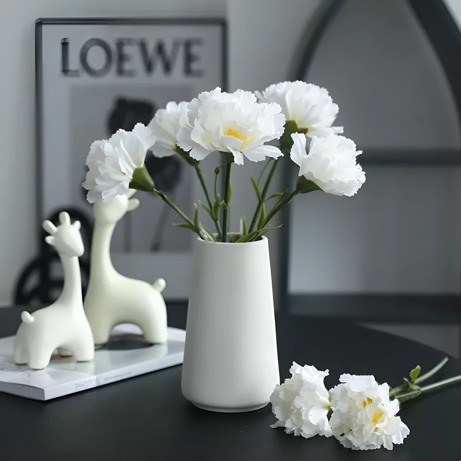 Artificial carnation flower with silk petals on soft rubber base in four colour options