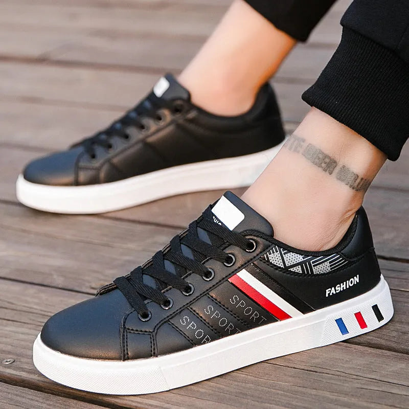 Sports shoes in black, grey, or white with mesh upper and cushioned sole