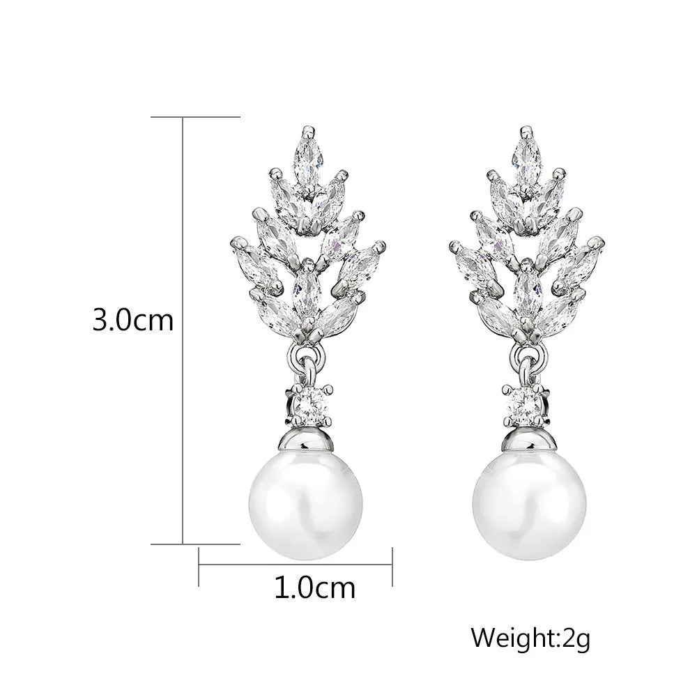 Geometric flower earrings with micro inlaid zircon stones on copper base, plated in gold, platinum, or rose gold.