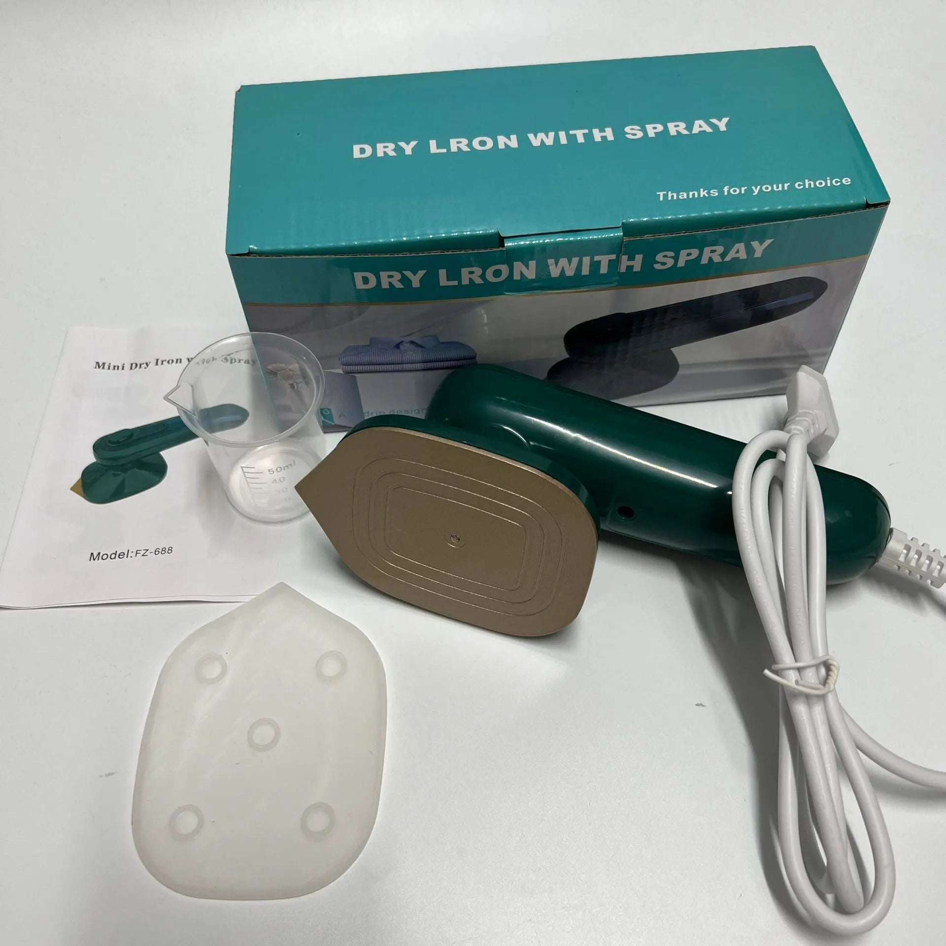Dark green handheld garment ironing machine with titanium panel and steam function