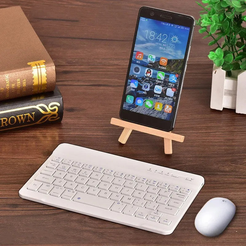 Mini Bluetooth wireless keyboard in black or white, showing compact design for 7-inch to 10-inch devices with 44-hour battery