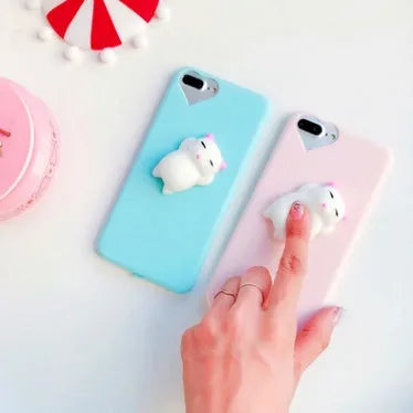 Silicone iPhone case with raised 3D cartoon cat design in multiple colour options
