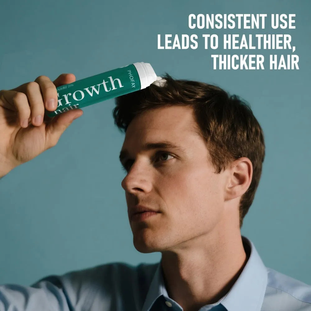 60ml canister of 5% minoxidil anti-hair loss foam mousse with a white pump applicator.