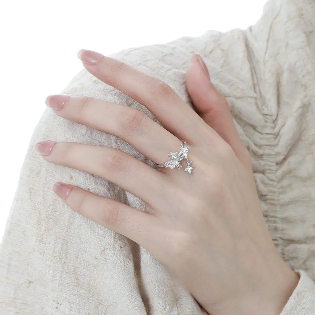 Adjustable silver ring with butterfly design in 18K gold or white gold electroplating on finger