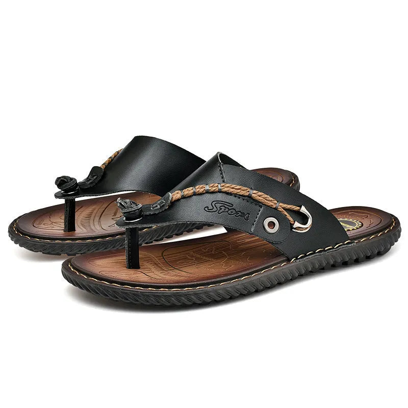 Men's black PU leather non-slip slippers showing sole traction pattern and casual design