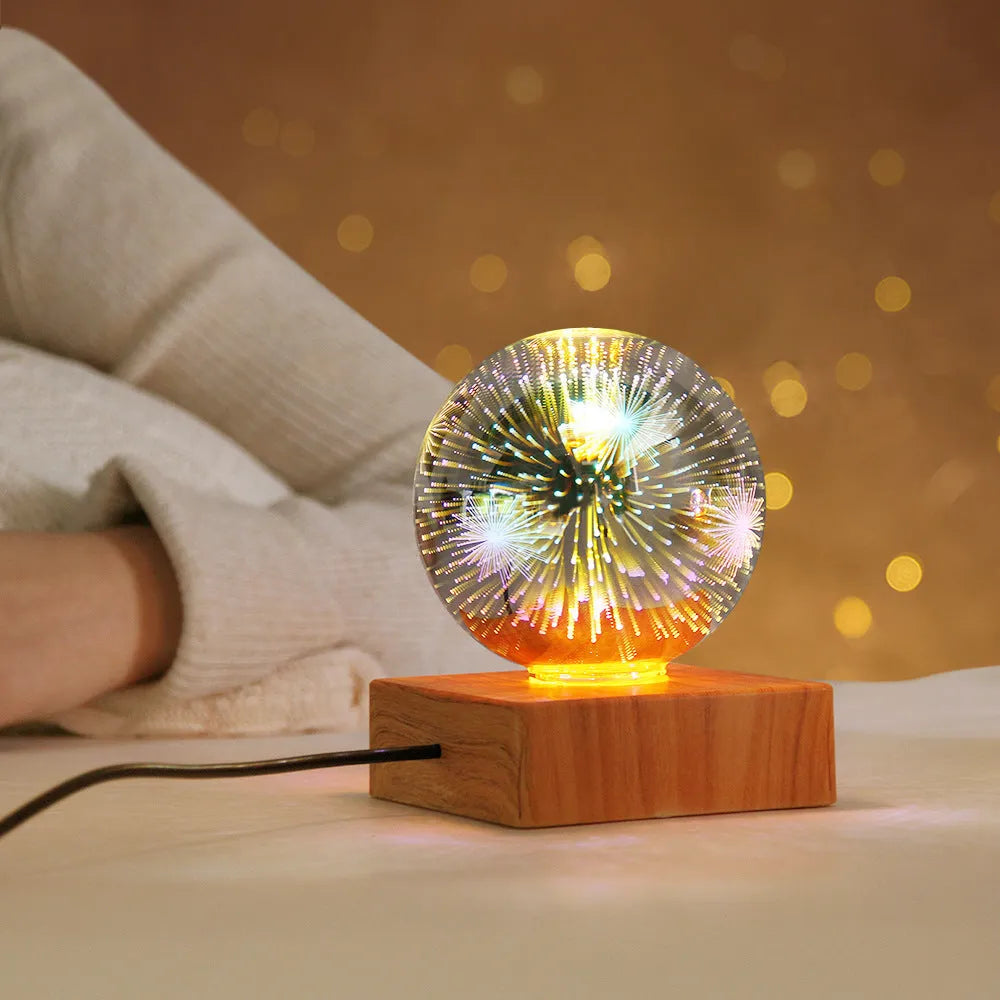 Spherical crystal ball night light with USB plug showing starry sky pattern illumination